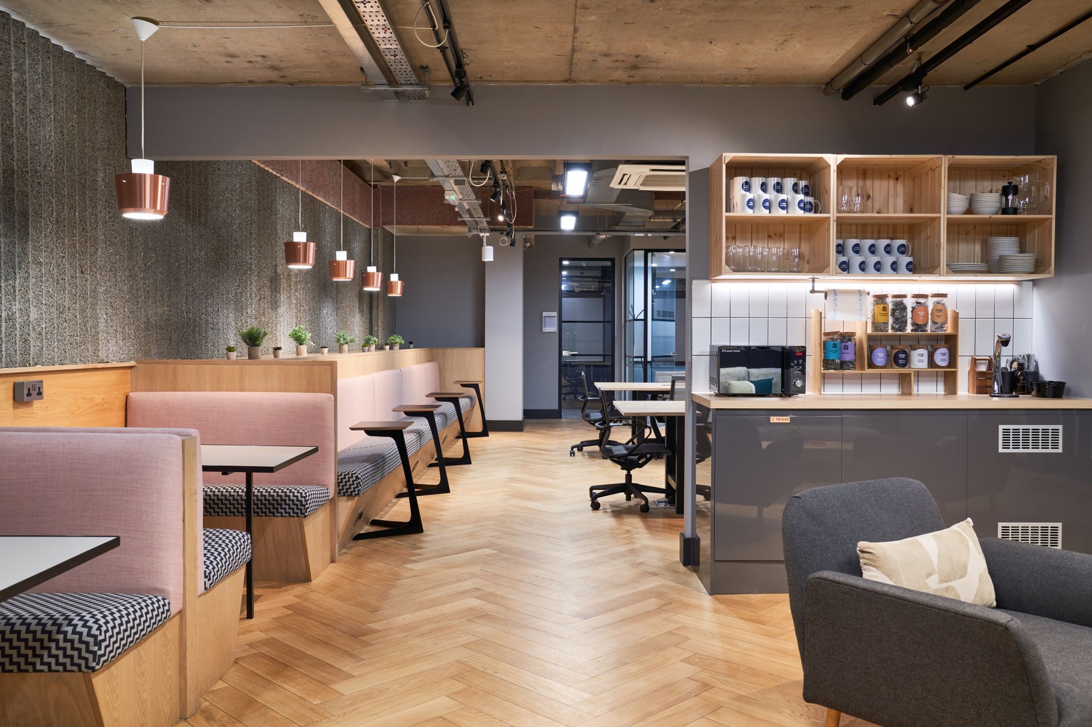 What does it mean to be a B Corp; Work.Life Office in Liverpool Street of shared working spaces, desks, and a communal kitchen. 